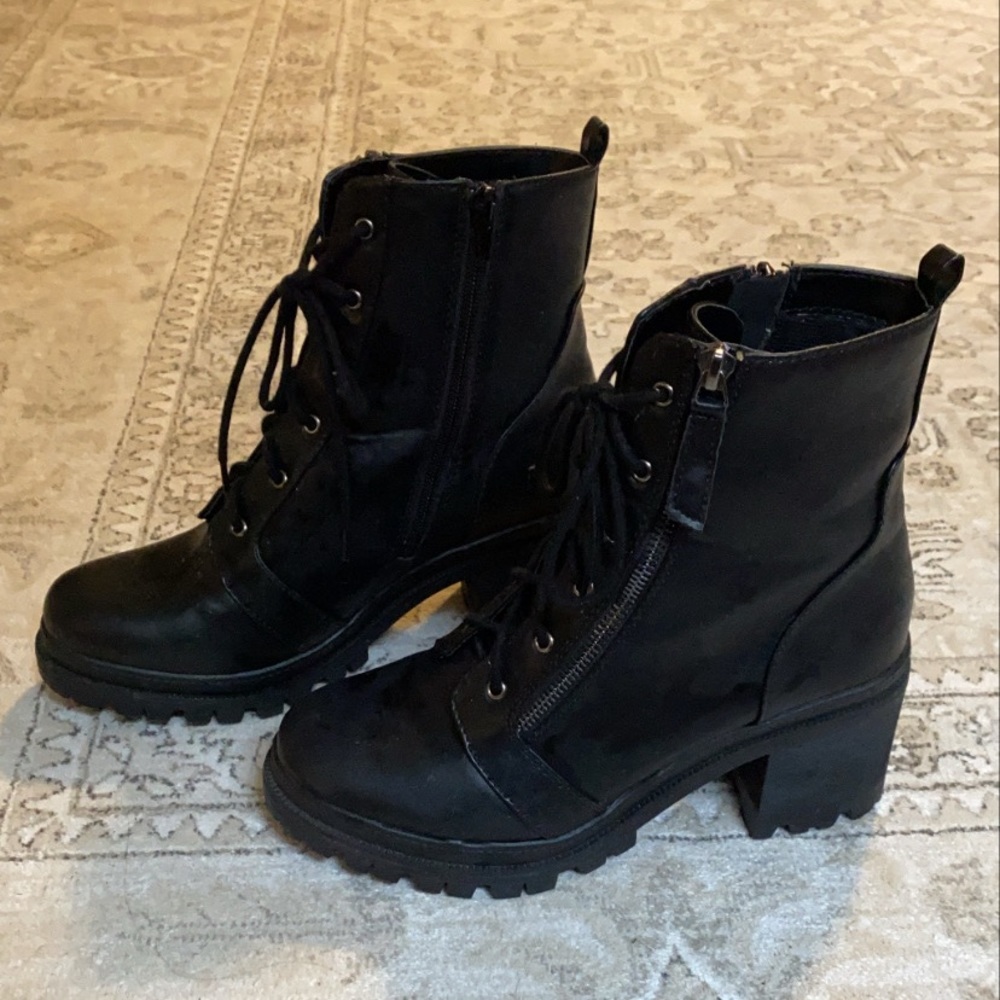 Black heeled combat boots